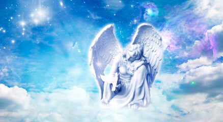 beautiful angel or arcgangel of peace and guardian angel of animals with dove over mystical mystic sky with clouds and stars and copy space like spiritul religious angelic divine cpncept  - obrazy, fototapety, plakaty
