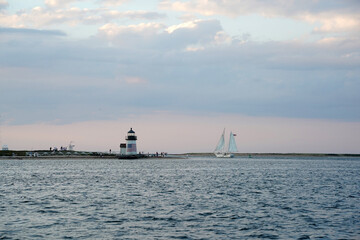 lighthouse of nantucket harbor view at sunset
