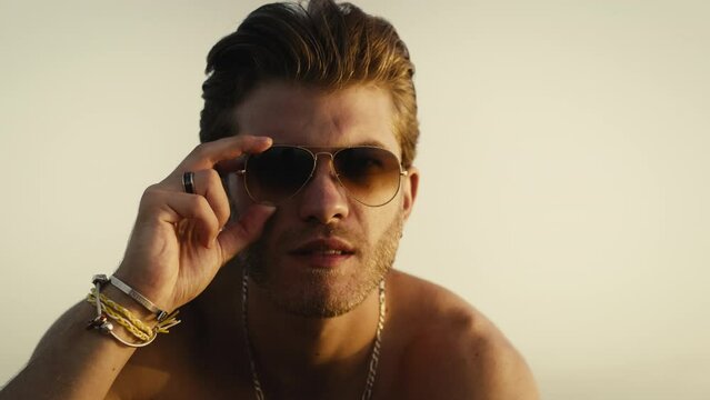 Handsome guy with sunglass smiling 