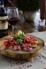 Salami and wine in restaurant