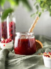 jam made from red berries. home preservation. strawberry and red currant jam