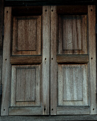 Obraz na płótnie Canvas old wooden window of a Malay house