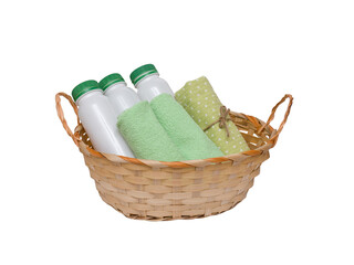 basket with plastic bottles and green towels