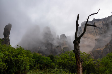 Panoramic view of unique rock formations near rock Aghio Pnevma (Holy Spirit) on cloudy foggy day...