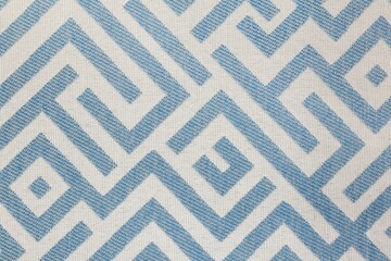 Closeup shot of a blue abstract patterned fabric textile surface