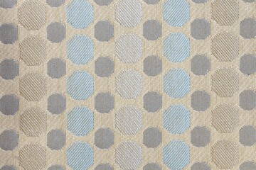 Closeup shot of a patterned polka dot fabric textile surface