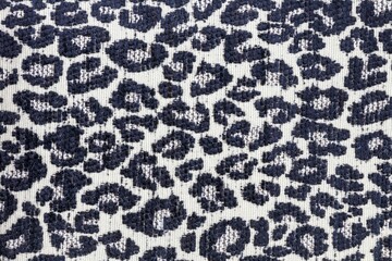 Closeup shot of a blue white leopard print patterned fabric textile surface