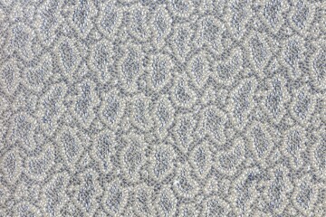 Closeup shot of a gray abstract patterned fabric textile surface