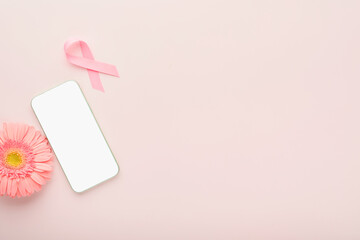 Pink Breast Cancer Awareness Ribbon. Gerbera and pink ribbon and white phone on backgrounds. Breast...