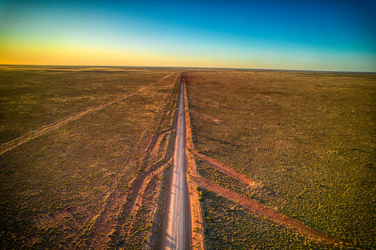 Aerial view along the Tanami Road at coordinates -20.885365, 130.620762. Northern Territory, Australia. August 2022.