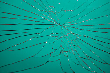 abstract background in blue green of broken mirror glass