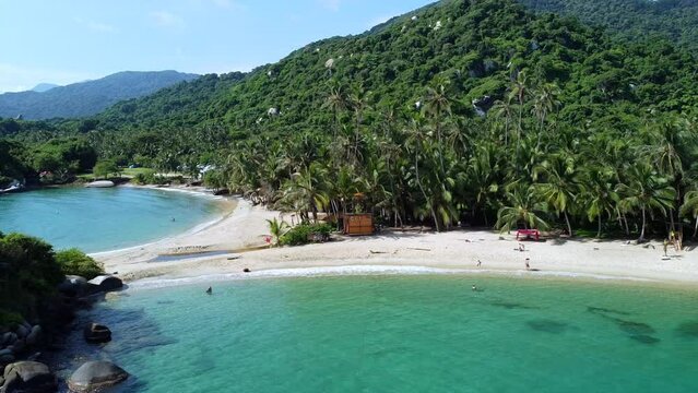 Santa Marta Colombia , Tayrona Natural Park Caribbean sea Cabo San Juan  - Drone aerial view of amazing  sand beach and  forest - Tourist attraction for relax and enjoy the paradise of the ocean sea 