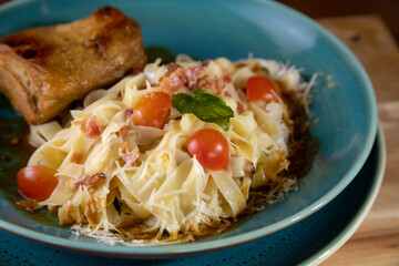 Typical peruvian food and drinks, pancetta with fettuccini