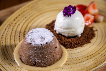 Typical peruvian food and drinks, chocolate volcano dessert with ice cream