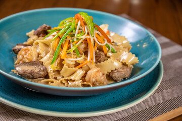 reginette pasta with meat and shrimp