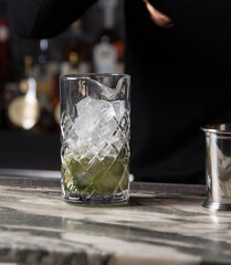 Ice and cocktail glass