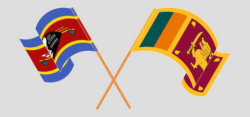 Crossed and waving flags of Eswatini and Sri Lanka