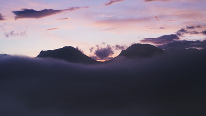 The typical view of sunrise taken in pangalengan, West Java. The dawn scene is still moderately covered with mist