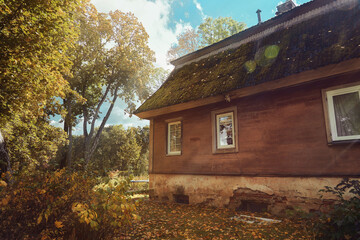 Old wooden house in Tiskevicius manor (atmospheric sun rays)            