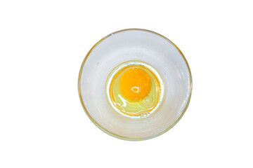 Raw egg yolk in bowl isolated on white background, top view