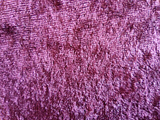 purple texture of plush velvet material for textile background