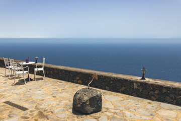 Resting place on the terrace near the ocean. Scenic view.