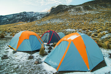 Tents in the snow in the mountains. Pico de Orizaba base camp.