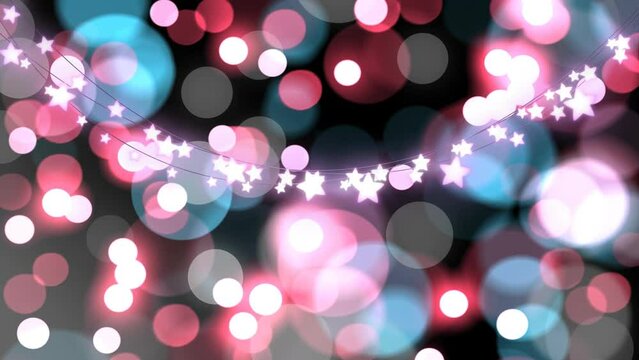 Animation of defocussed coloured christmas lights and glowing star string lights