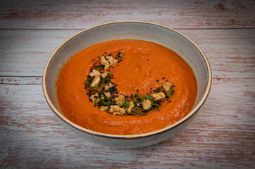 Recipe for dip with red pepper, walnuts, olive oil and cumin and chilli pepper, topped with black and white sesame seeds, crushed walnuts, garlic and lemon, High quality photo