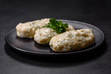 Traditional Lithuanian dish zeppelin, boiled potato dumplings stuffed with minced meat