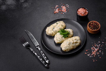 Traditional Lithuanian dish zeppelin, boiled potato dumplings stuffed with minced meat © chernikovatv