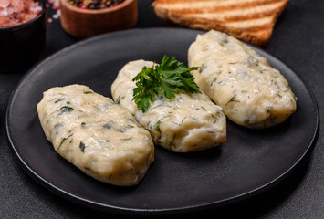 Traditional Lithuanian dish zeppelin, boiled potato dumplings stuffed with minced meat