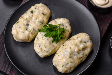 Traditional Lithuanian dish zeppelin, boiled potato dumplings stuffed with minced meat