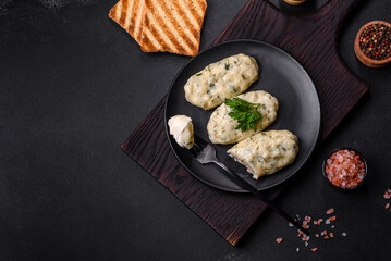 Traditional Lithuanian dish zeppelin, boiled potato dumplings stuffed with minced meat © chernikovatv