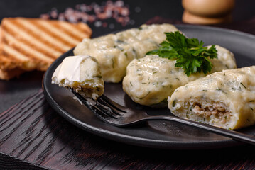 Traditional Lithuanian dish zeppelin, boiled potato dumplings stuffed with minced meat © chernikovatv