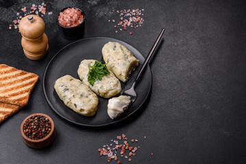 Traditional Lithuanian dish zeppelin, boiled potato dumplings stuffed with minced meat