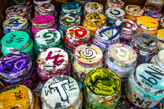 Paint Containers In An Art Studio In Asheville, North Corolina.