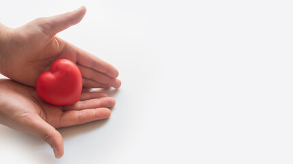 Title	
Heart in hands.Organ donation and insurance concept. World heart health concept. World organ donation day. Concept of healthy heart for healthy life. philanthropy idea concept.