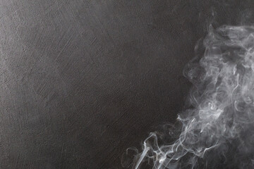 White smoke on the right on a black background