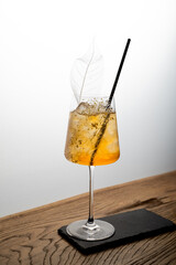 cocktail based on gin Roku, sherry, vermouth, prosecco and cordial of buckwheat, raspberries and ice cream. Served with buckwheat ice cream.