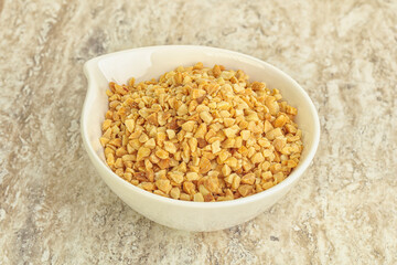 Crunched roasted peanut in the bowl