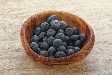 Sweet ripe blueberry heap in the bowl