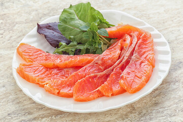 Sliced salmon fillet starter snack