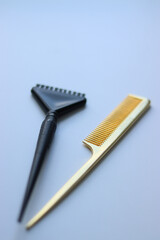 coloring comb.coloring comb and hair comb.calorist tools.calorist comb.comb on white background
