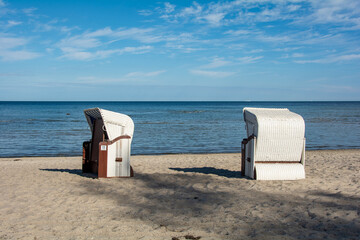 Wicker beach baskets on a sand  beach at the Baltic Sea