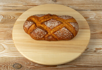 Freshly Baked Traditional Bread on Wooden Background