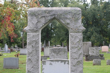 Stone Monuments In A Cemetery.  