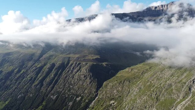 Drone views over 2600m of altitude with waterfalls. French Pyrenes mountains.