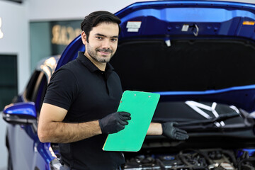 Car mechanic working with a Service checking car engine	