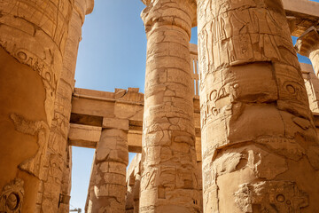 Different hieroglyphs on the walls and columns in the Karnak temple. Karnak temple is the largest...